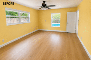 Room before interior painting and flooring installation in Broward County